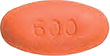 600と書かれたオレンジ色の錠剤