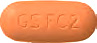 GS FC2と書かれたオレンジ色の錠剤